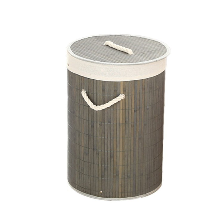 Laundry basket made of natural bamboo by Bowlift