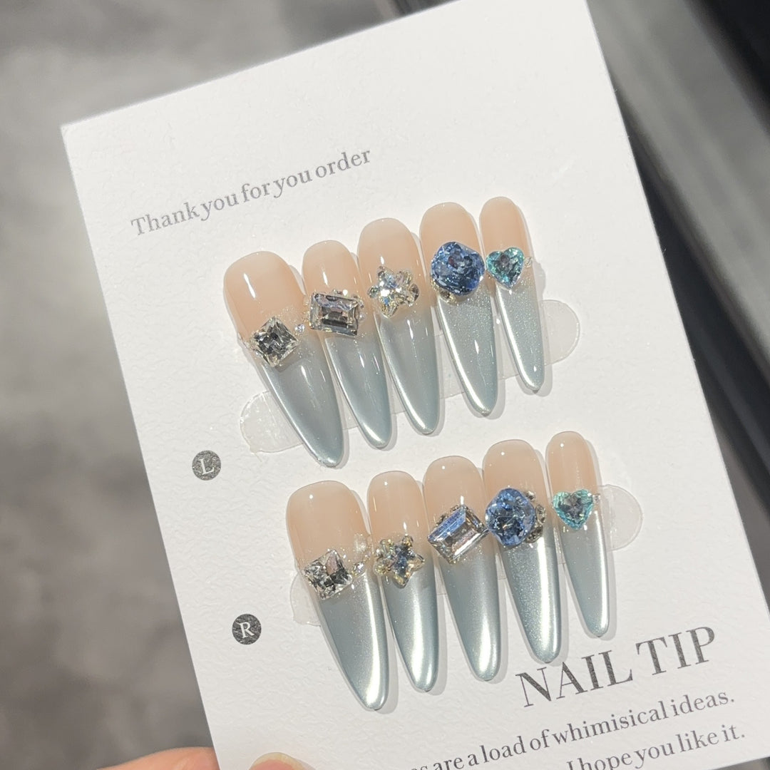 Glamorous artificial nails with sparkling stones Bowlift