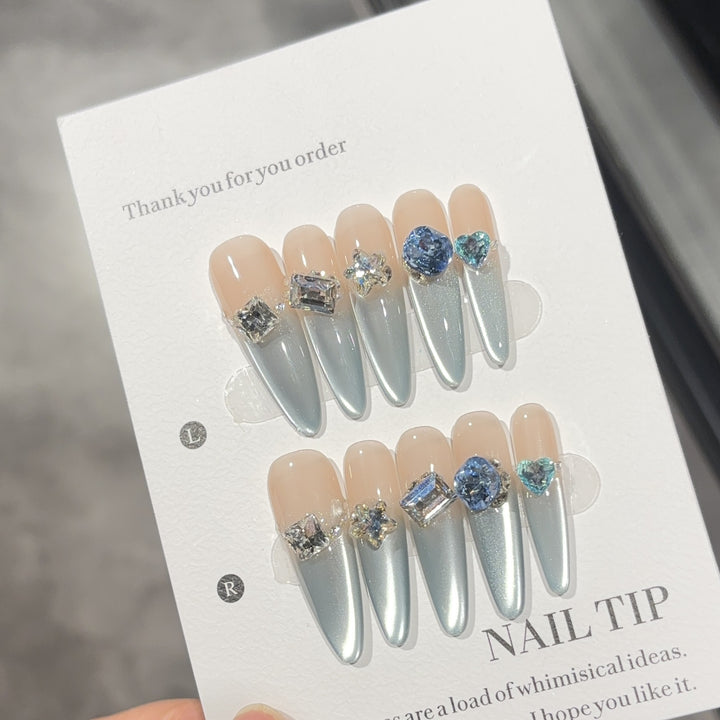 Glamorous artificial nails with sparkling stones Bowlift