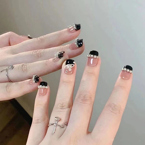 Glamorous nail art with rhinestone embellishments Bowlift