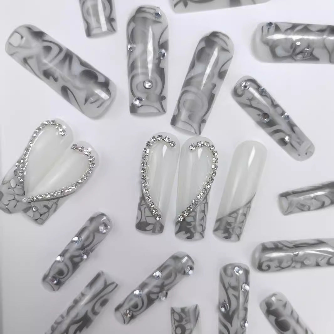 Artificial nails with modern night motif Bowlift