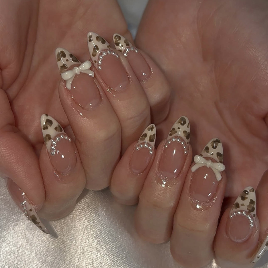 Artistic Press-On Nail Set with Bow and Animal Print Bowlift