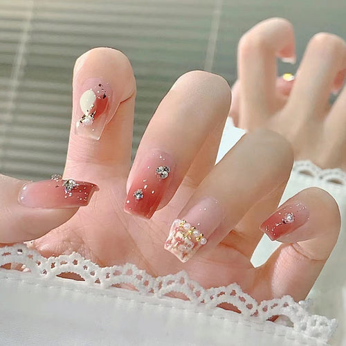 Decorative Press-On Nail Extensions with Gem Accents Bowlift