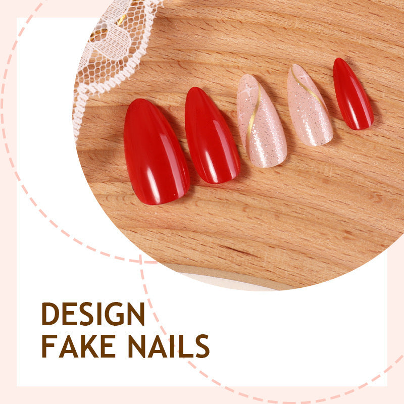 Artificial nail set with shiny red surface and stylish accents Bowlift