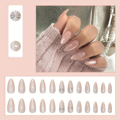 Artificial nail set with delicate glitter and elegant bow decorations Bowlift