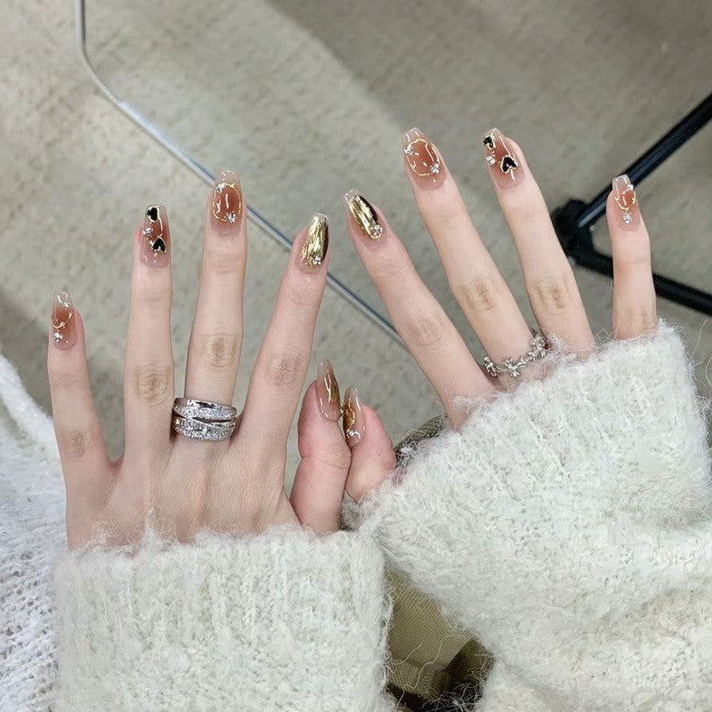 Artistic Press-On Nail Set with Heart and Glitter Accents Bowlift