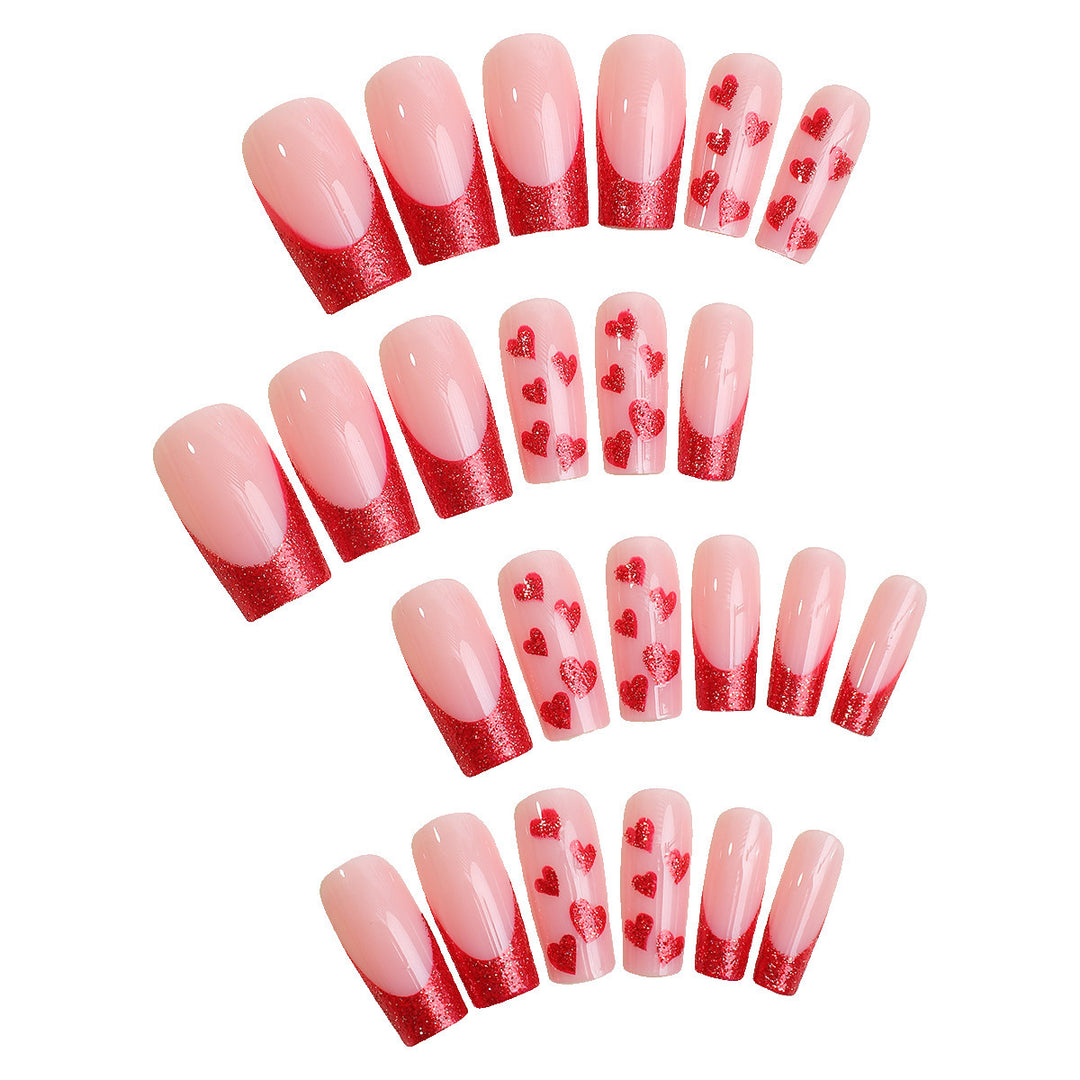 Acrylic nail set with glamorous heart designs and glitter accents Bowlift