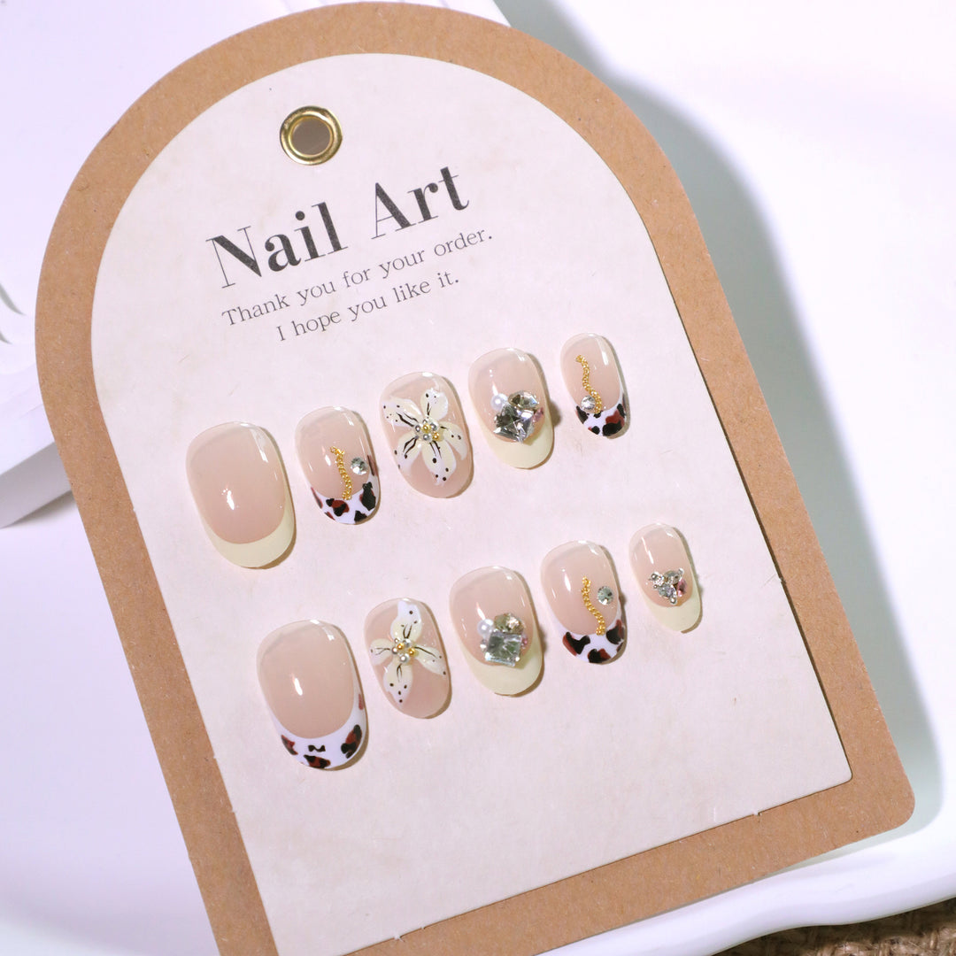 Exclusive nail art with floral design and glitter accents Bowlift