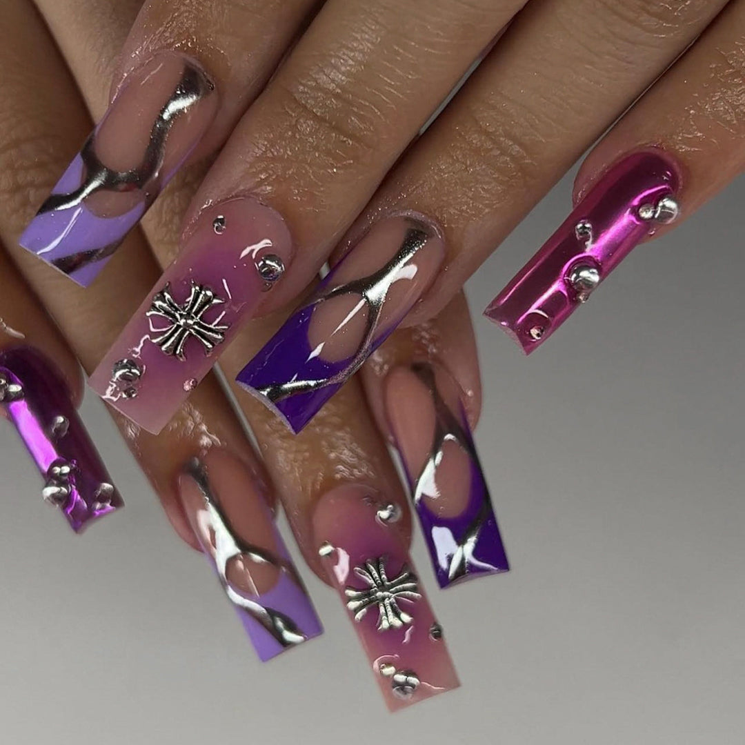 Artistic nail extensions with glitter and flower motifs Bowlift