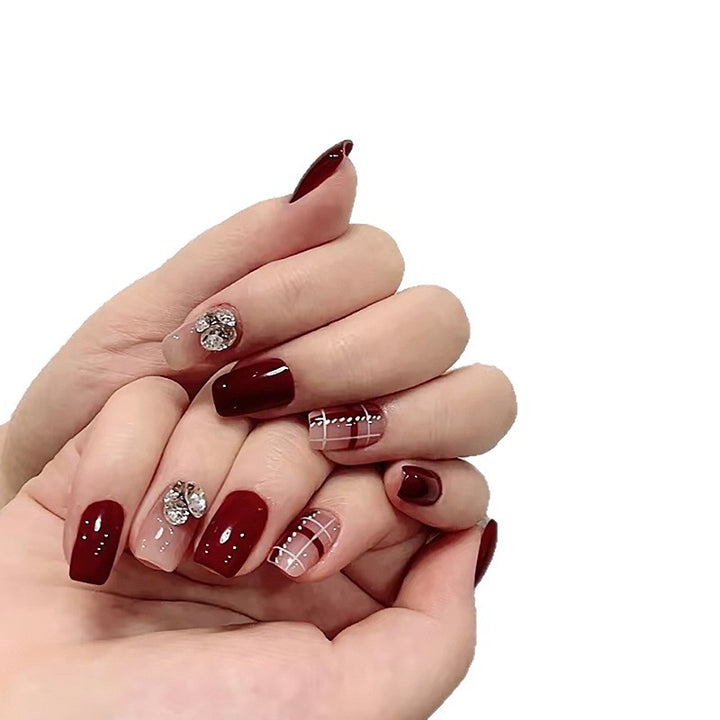 Artificial nail set with elegant, shimmering design and creative accents Bowlift