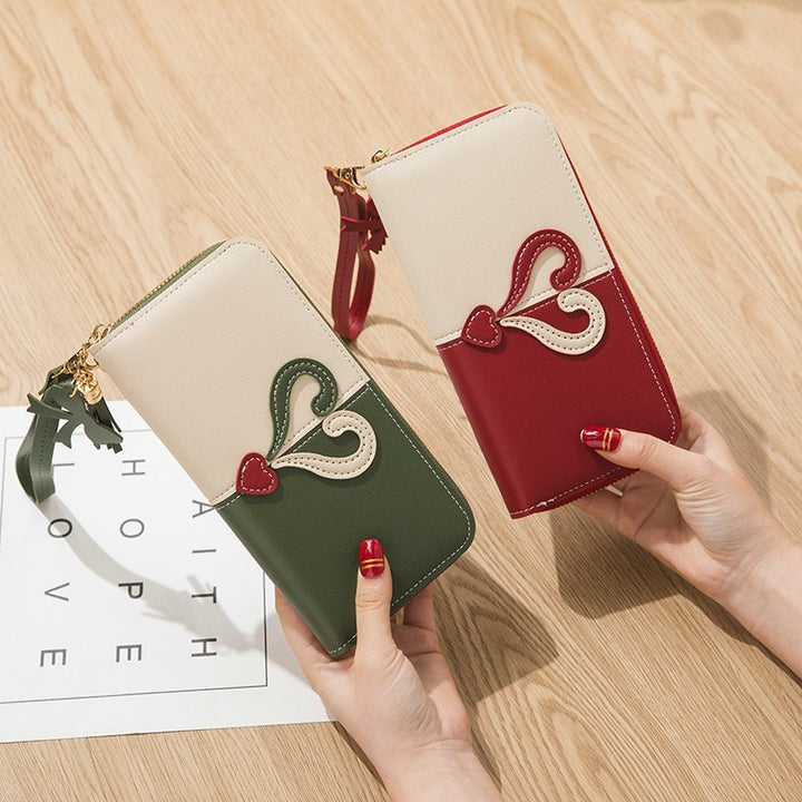 Stylish wallet with heart appliqués Bowlift