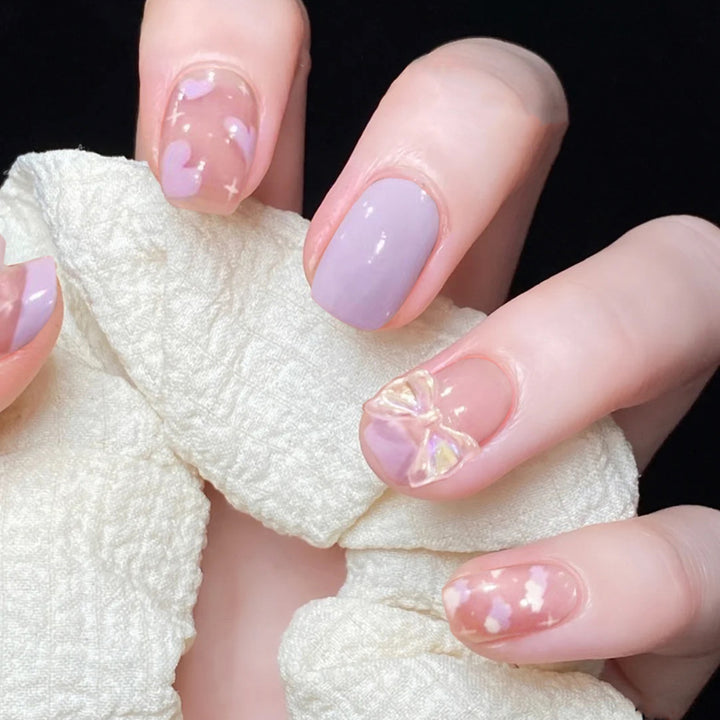 Artful nail extensions with an elegant leaf pattern Bowlift