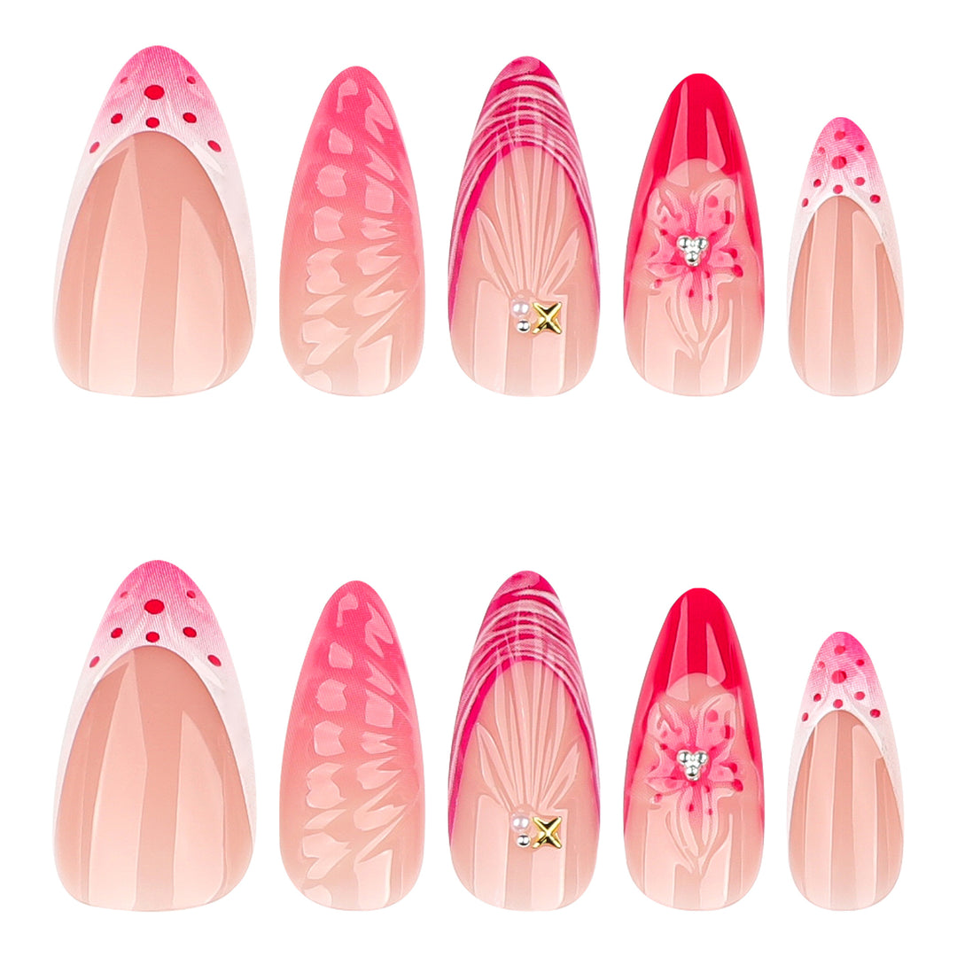 Artful stiletto nails with floral design and glitter accents Bowlift