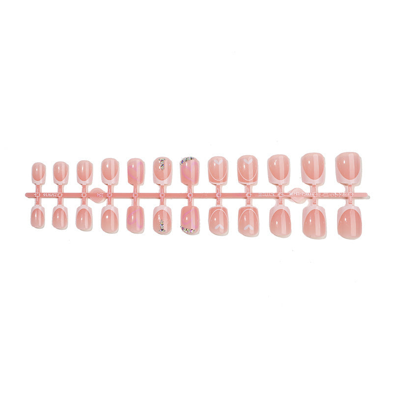 Artificial nail set with glitter and heart motifs Bowlift