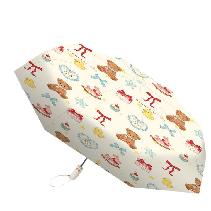 Women's folding umbrella with automatic opening mechanism and playfully themed design Bowlift