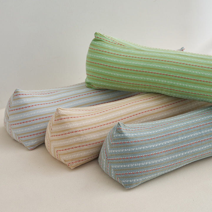 Ergonomic neck roll with stylish striped pattern Bowlift