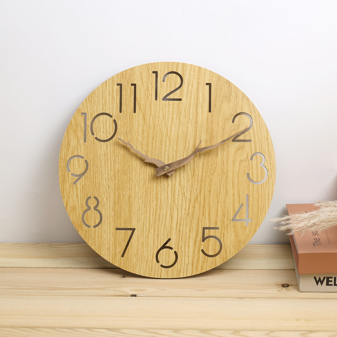 Wall clocks made from untreated wood Bowlift