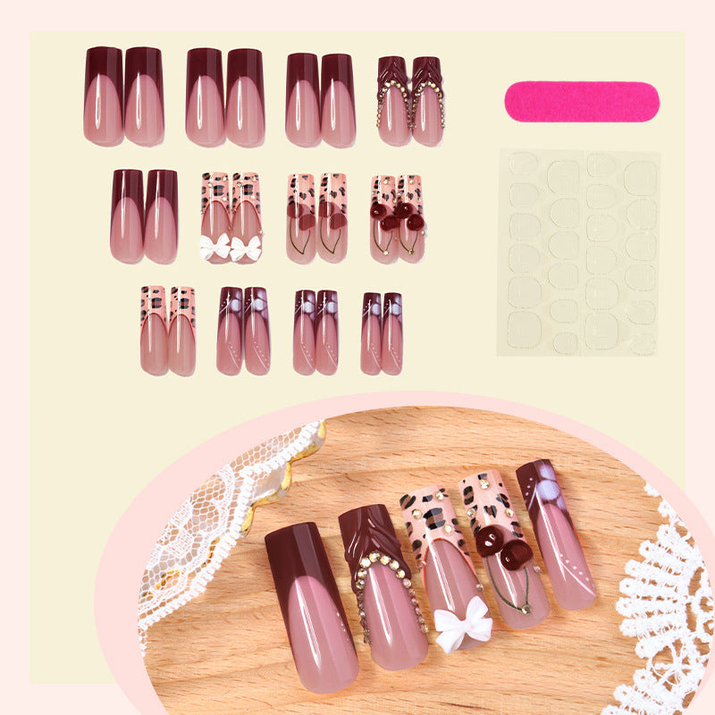 Artistic Press-On Nail Set with Decorative Accents Bowlift