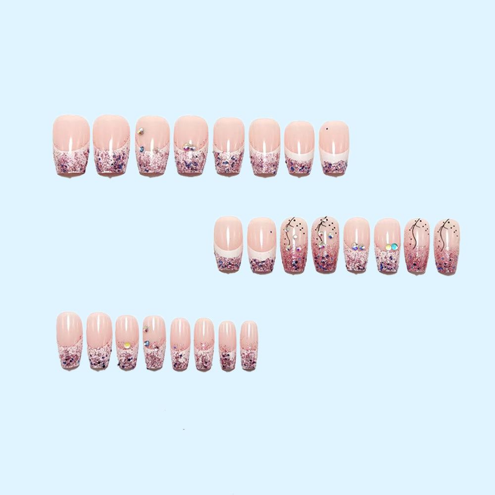 Glittering artificial nails with elegant tip and sparkling accents Bowlift