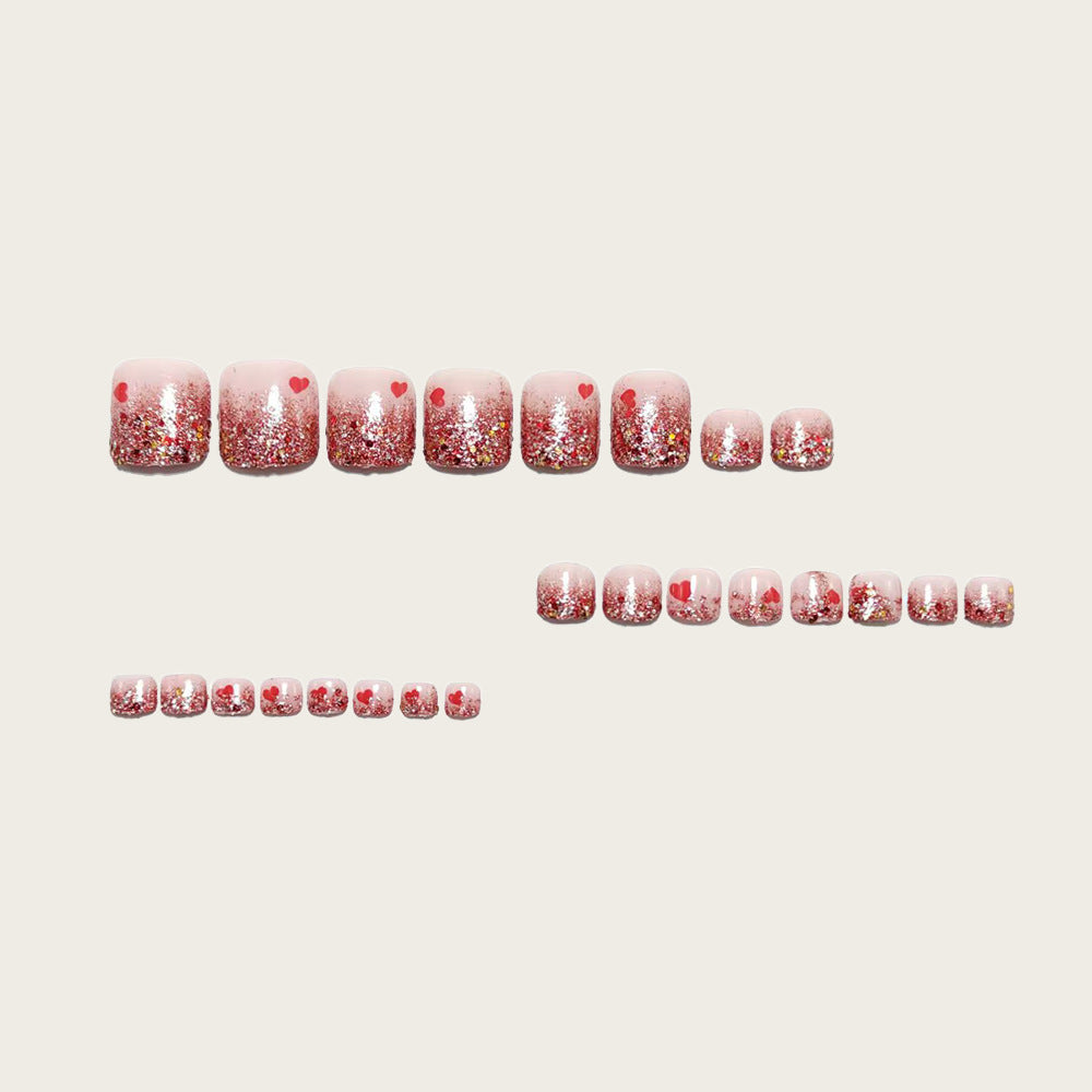 Nail art with sparkling hearts Bowlift