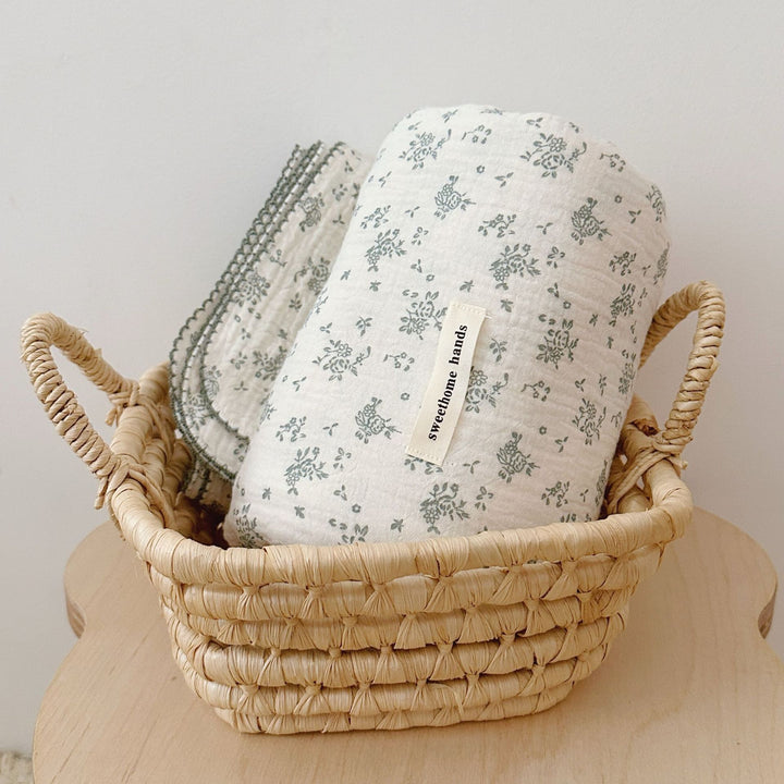 Unisex Muslin Blanket with delicate floral design and elegant ruffles Bowlift