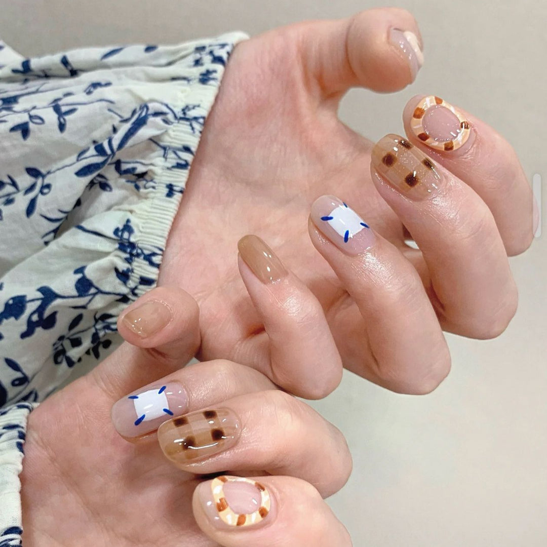 Playful artificial nails with cute animal and pattern accents Bowlift