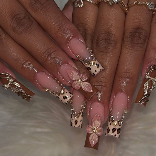 Artistic Long Press-On Nail Extensions with Elegant Floral Design Bowlift