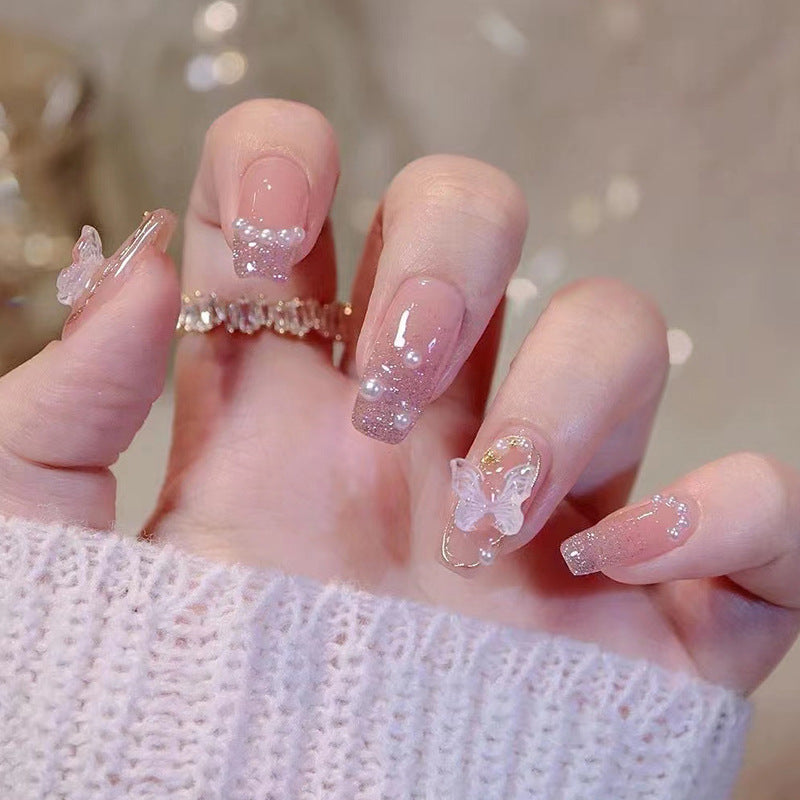 Artificial nails with glamorous pearl details Bowlift