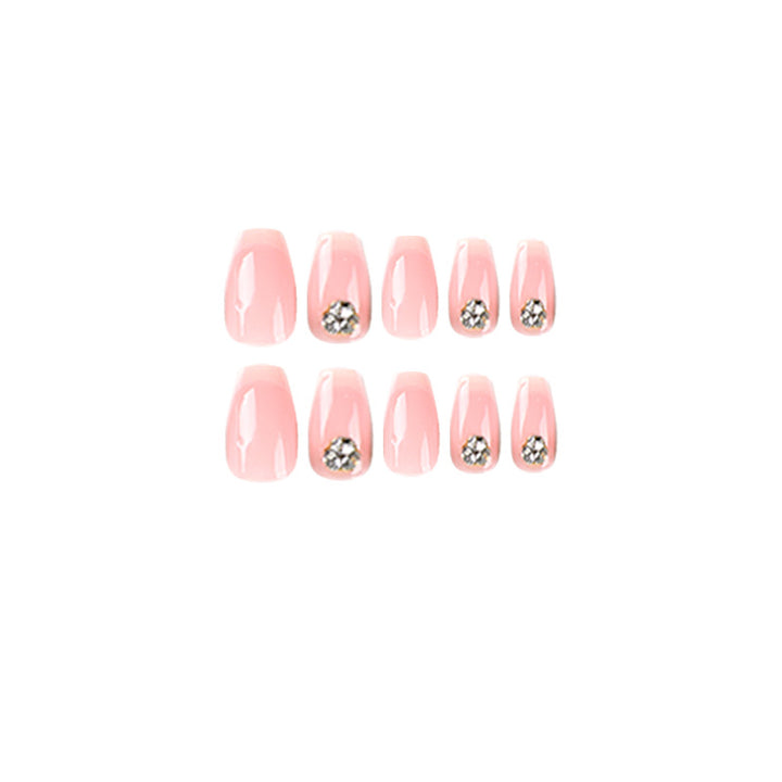 Artful nail extensions with elegant French tip and rhinestone embellishments Bowlift