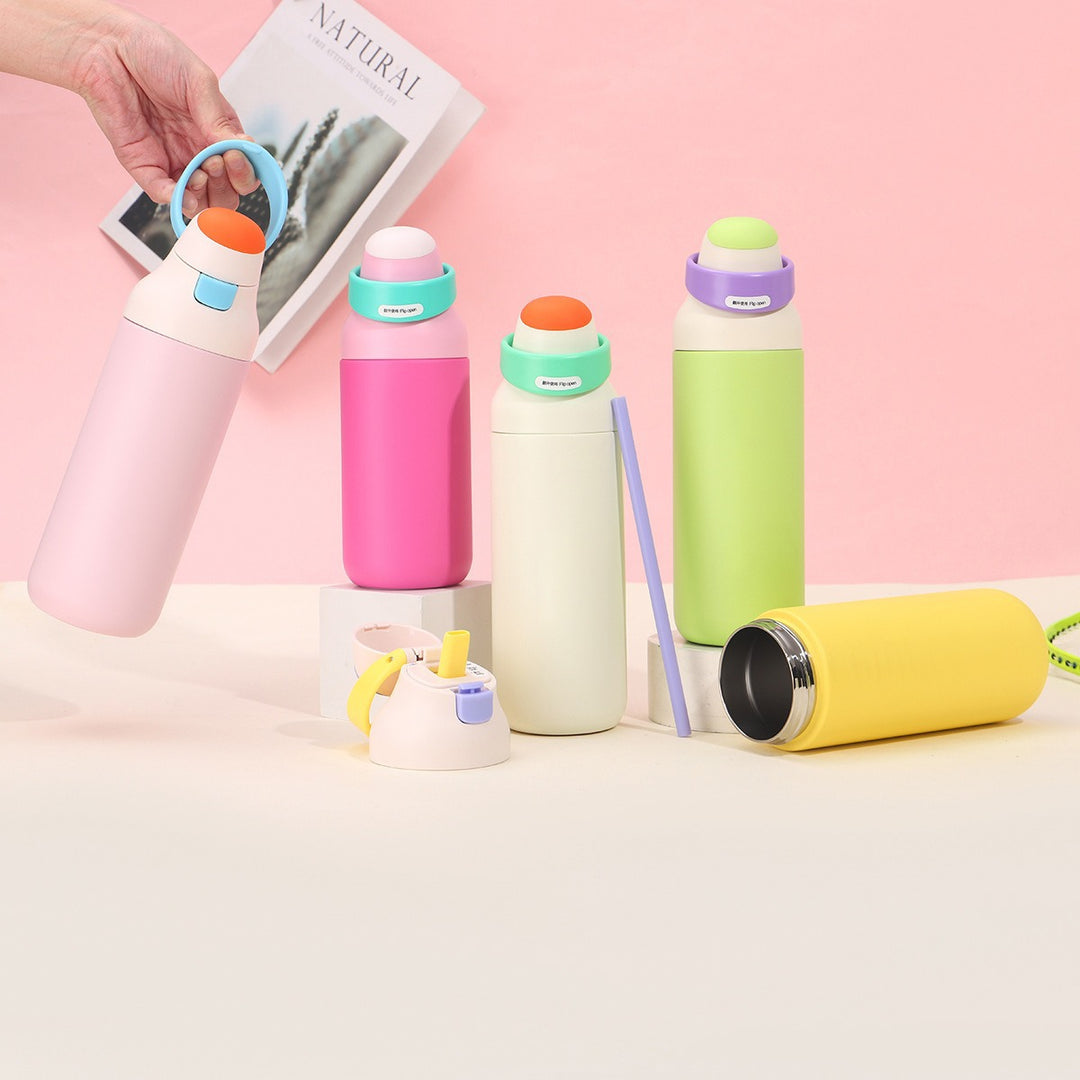 Women's insulated drinking bottle with ergonomic closure Bowlift