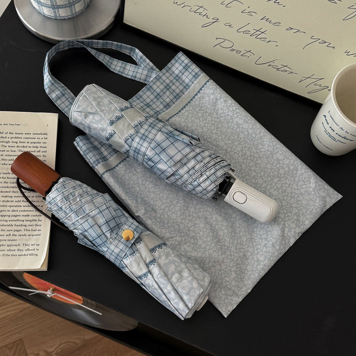 Women's tote bag with integrated folding umbrella Bowlift