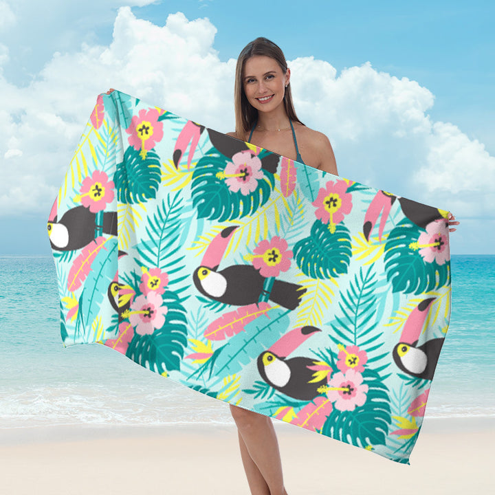 Beach towel with tropical leaf design Bowlift