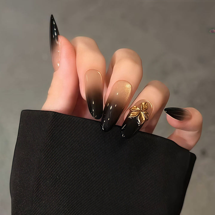 Glamorous artificial nails with intricate flower and glitter effects Bowlift