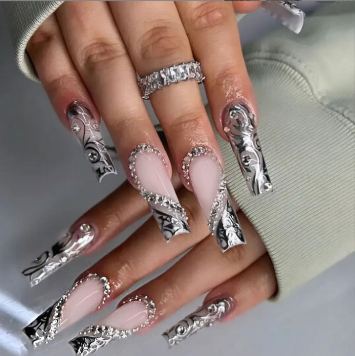 Acrylic nail set with elegant patterns and sparkling accents Bowlift
