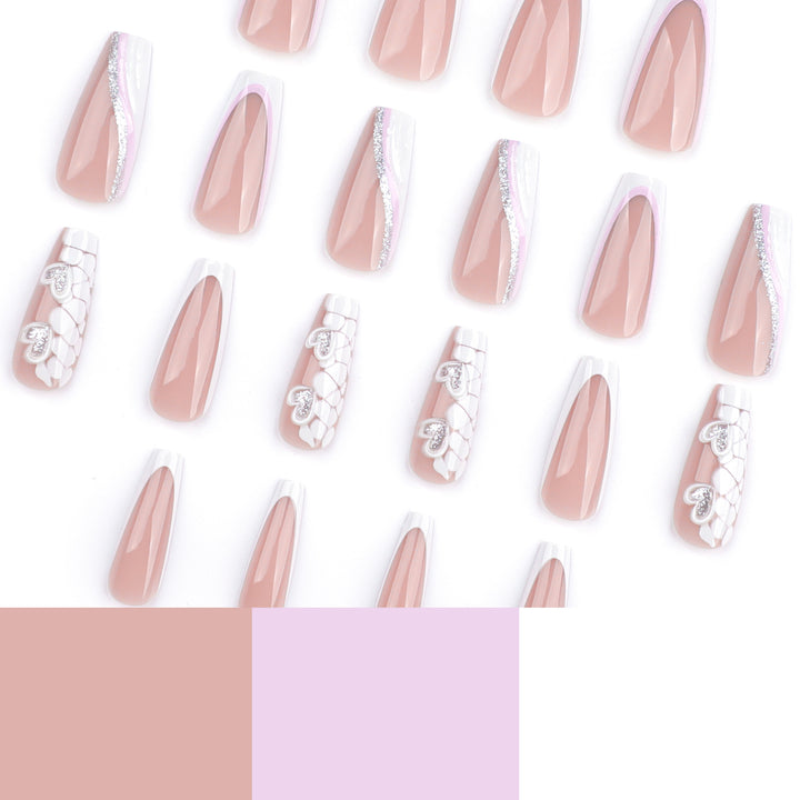 Artful Nail Extensions with Heart Design and Glitter Accents Bowlift