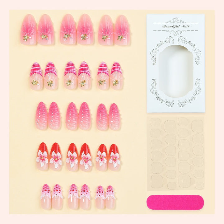 Acrylic nail set with luxurious glitter and flower accents Bowlift