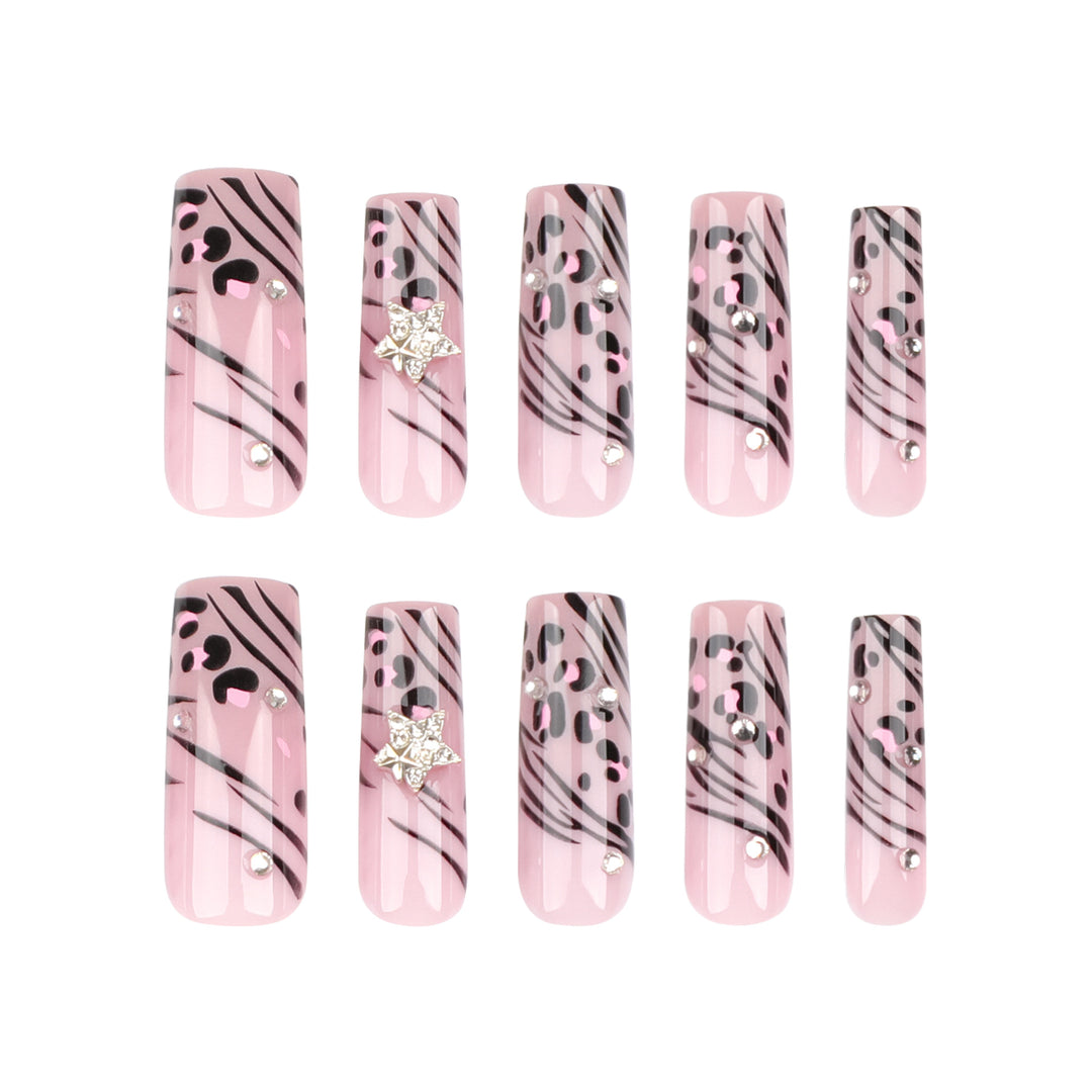 Artful Nail Art with Zebra Pattern and Glitter Accents Bowlift