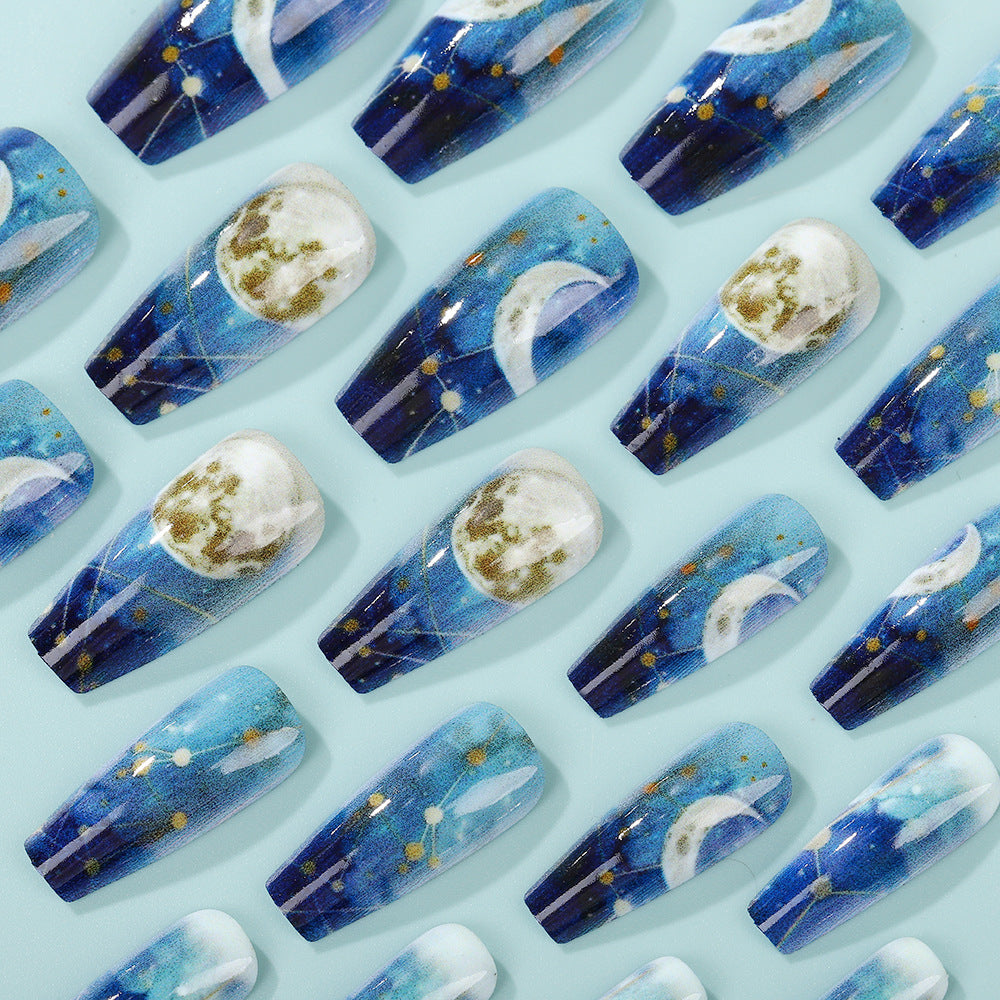 Dreamy artificial nails with moon and star design Bowlift