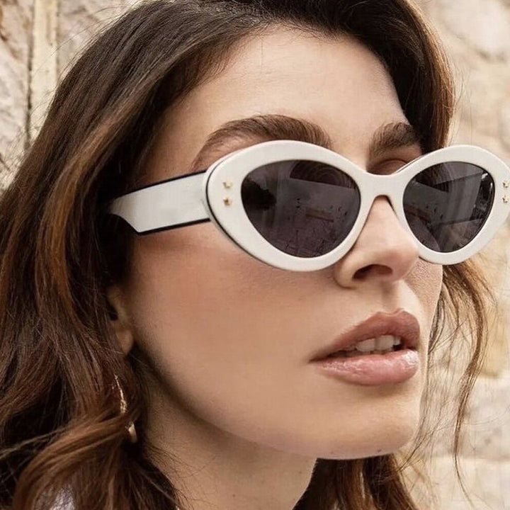 Ladies Cat-Eye Sunglasses with Luxurious Plastic Frame and Decorative Accents Bowlift