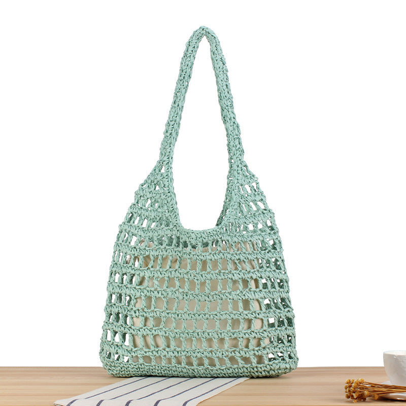 Handcrafted net shoulder bag with sturdy carrying handle Bowlift