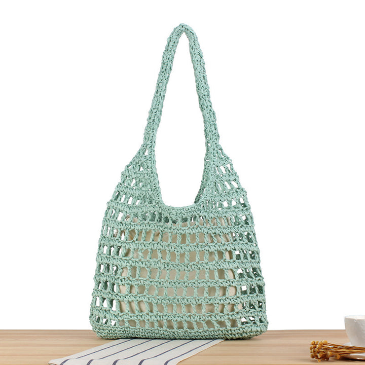 Handcrafted net shoulder bag with sturdy carrying handle Bowlift