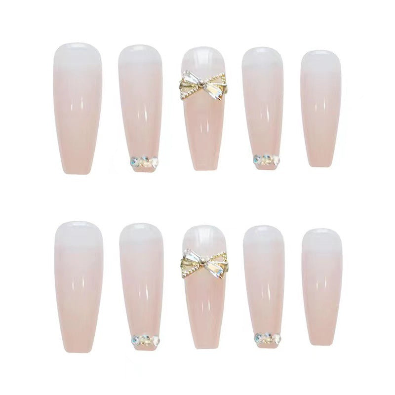 Artificial nails with elegant rhinestone embellishments Bowlift