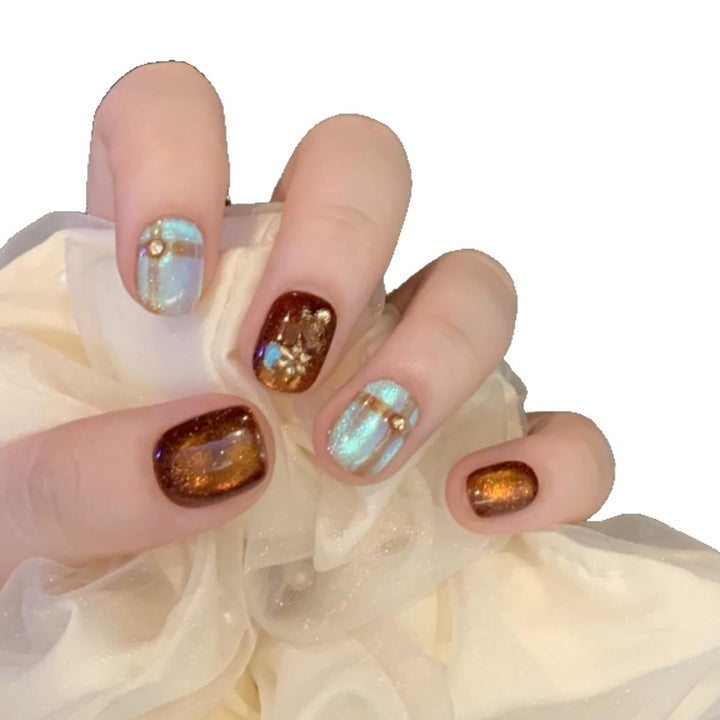 Artificial nail art tips with shimmer and glitter Bowlift