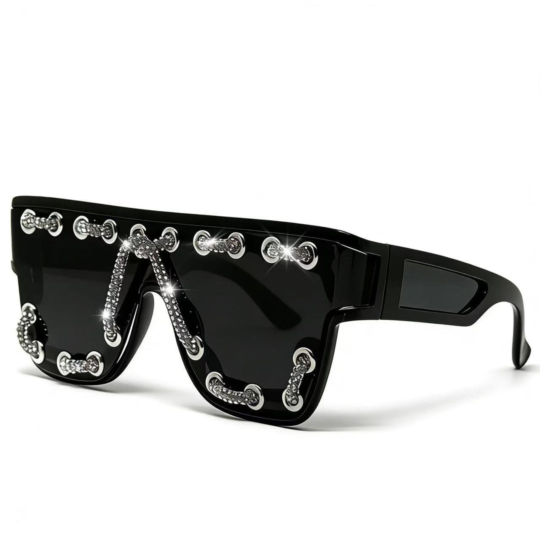 Ladies sunglasses with extravagant design and decorative chain embellishment Bowlift