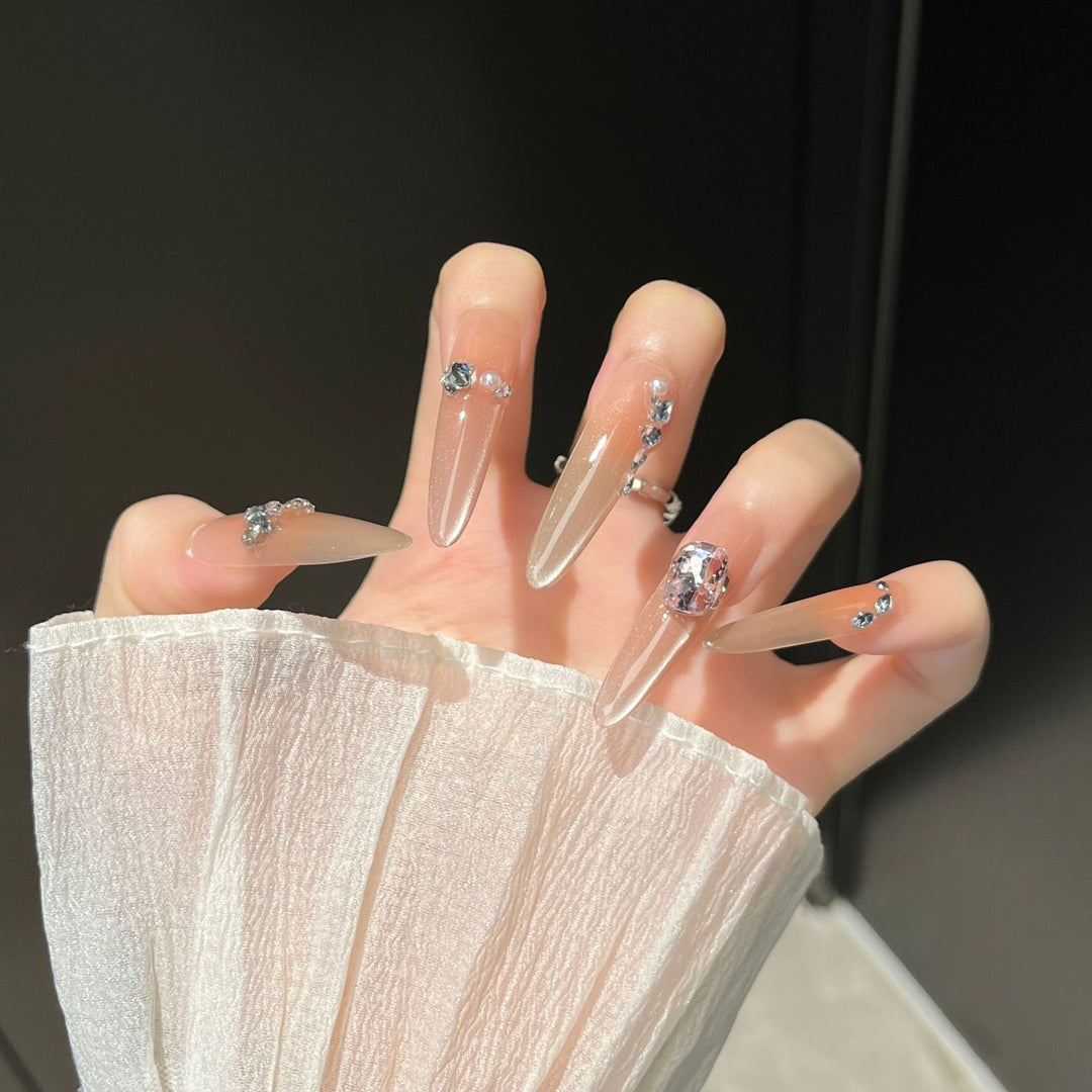 Artistic Stiletto Press-On Nail Art with Glimmering Accents Bowlift
