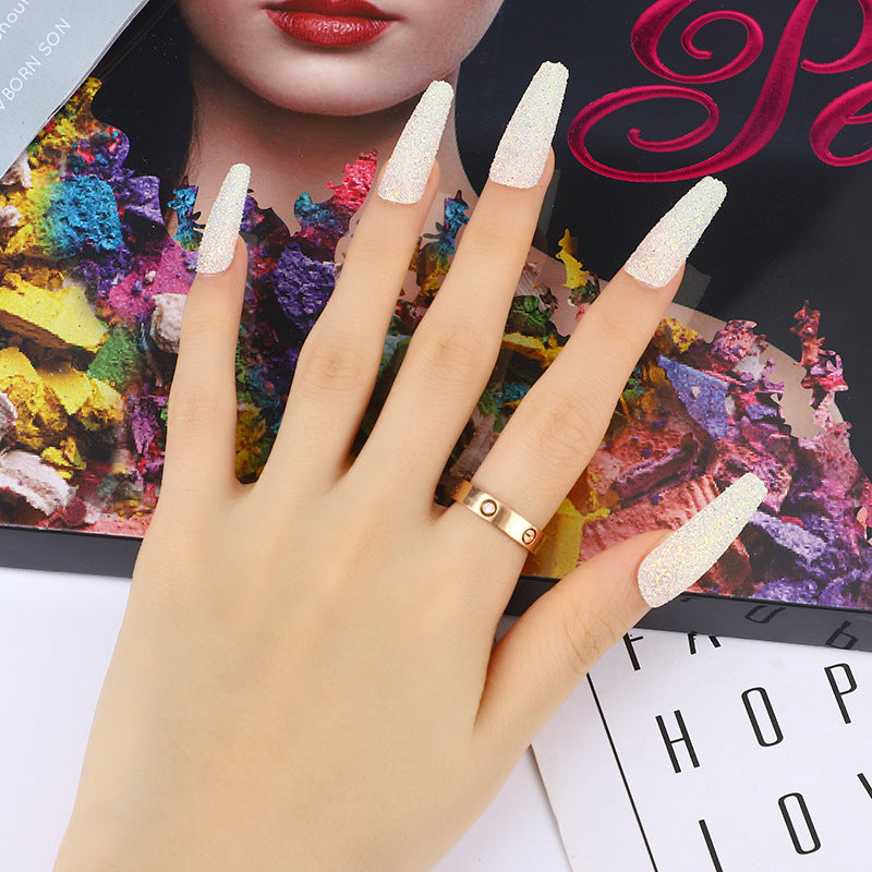 Glamorous artificial nails with glitter effects Bowlift