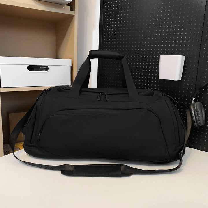 Sporty travel bag with many compartments Bowlift