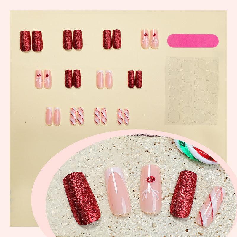 Artificial nail set with sparkling glitter and festive accents Bowlift