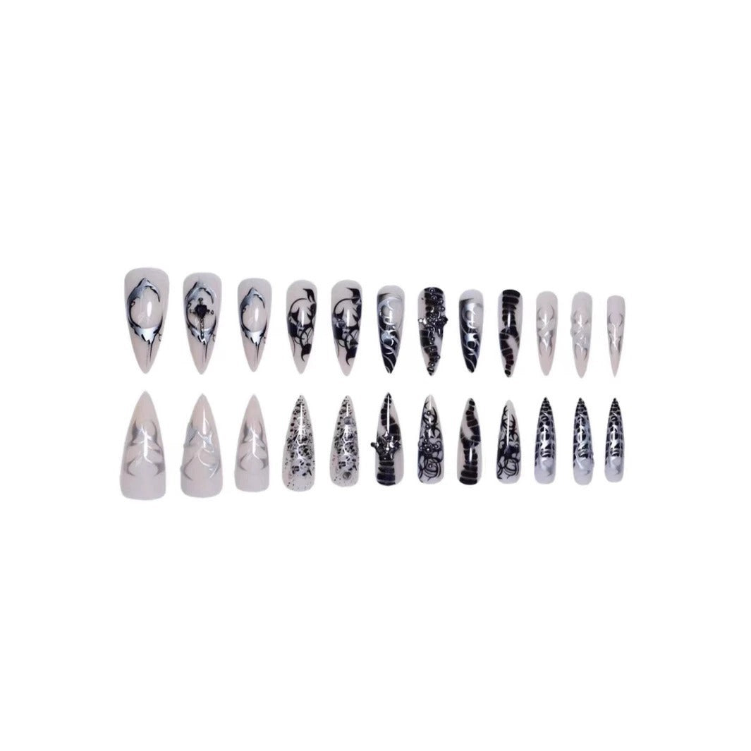Artistic Stiletto Nail Extensions with Black Detailing Bowlift
