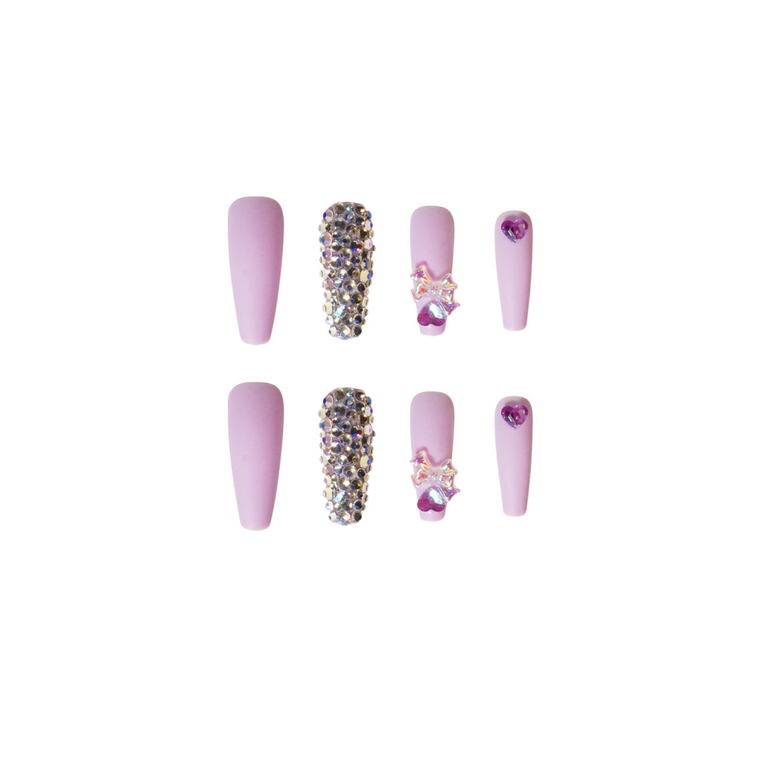 Artistic Stiletto Nails with Glitter and Flower Decorations Bowlift